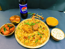 Hyderabadi chicken dum biryani dessert combo