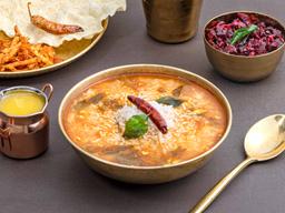 Rasam and poriyal rice bowl