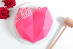 Pink pinata heart cake [egg]
