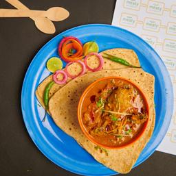 Chicken curry with tawa parathas