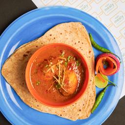 Egg curry with tawa parathas