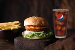 Spiced royal chicken burger with fries and pepsi