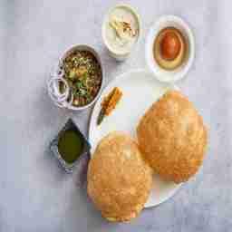 Chole bhature + 1 malai lassi + 1 pc gulab jamun
