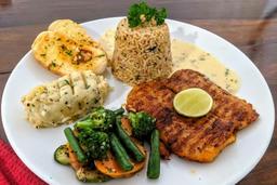 Grilled fish steak with lemon butter sauce
