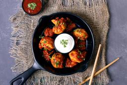 Kk chicken cheese pan tossed momo