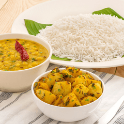 Homestyle dal tadka, marwadi aloo & steamed rice