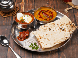 Makhani egg, dal makhani, rumali roti thali