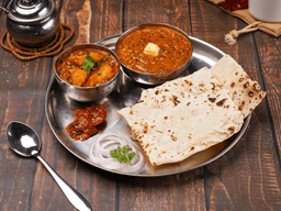 Kadhai chicken, dal makhani, rumali roti thali