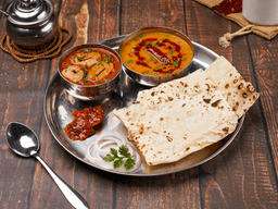 Makhani soya chaap, dal tadka, rumali roti thali