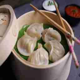 Chicken cheese steamed momo