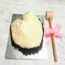 White chocolate heart pinata cale eggless