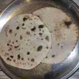 Bajra rotla [2] served with jaggery & lassun ki chuttney
