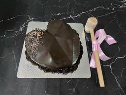 Dark chocolate heart pinata cake eggless
