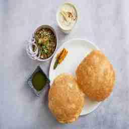 Chole bhature + 1 malai lassi