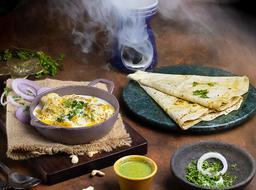Malai chaap gravy + any choice of bread + salad + pickle