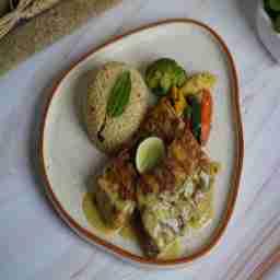 Grilled fish with para-styled mustard sauce and couscous