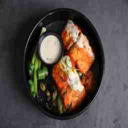 Mexican grilled fish with zucchini bed and veloute sauce