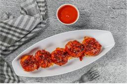 Veg schezwan tossed momo