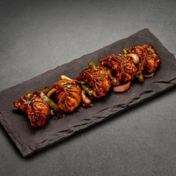 Chilli tossed chicken momo