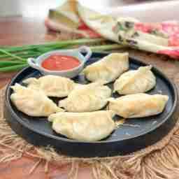 Veg cheese steam momo