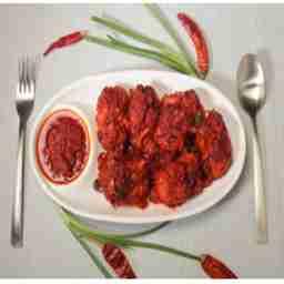 Chicken schezwan tossed momo