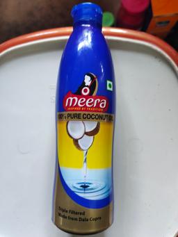 meera 100% pure coconut hair oil 